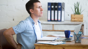 chiropractic-checkup-office-man-suffering-from-backache