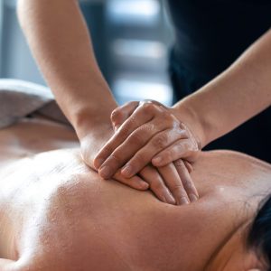 Double hand pressure center back. Strength and softness Deep tissue massage